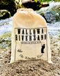 22 oz. Wallowa RiverSand refill bag resting on the Wallowa Rivers sandy banks